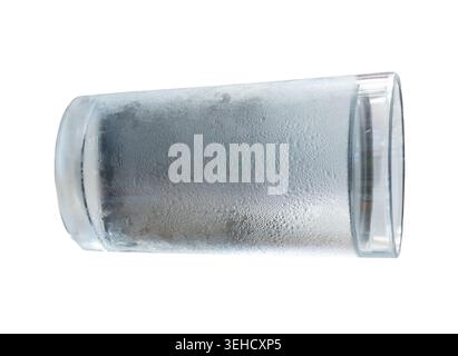 Drinking water with ice cubes in transparent glass is isolated on white background with clipping path. Stock Photo