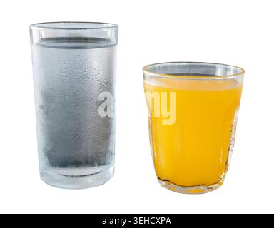 A set of drinking water and orange juice in transparent glassess is isolated on white background with clipping path. Stock Photo
