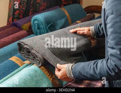 Traditional Harris Tweed, which has a long history in Stornoway on the Scottish Isle of Lewis and throughout the archipelago of the Outer Hebrides. Stock Photo