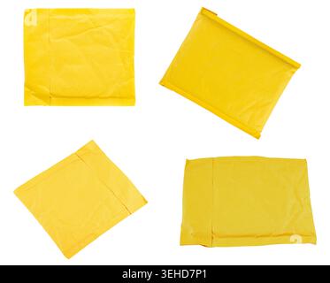 Set of yellow padded envelopes isolated on white background. Bubble mailer packaging in different angles and shapes, realistic texture. Perfect for sh Stock Photo