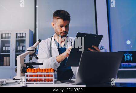 Attractive student of chemistry working in laboratory Stock Photo