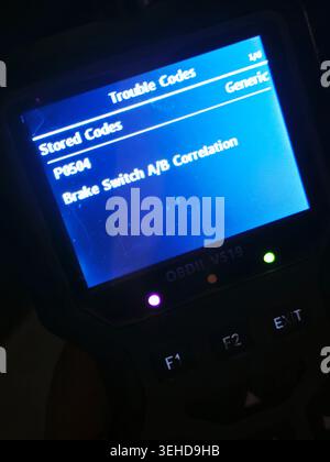 Cairo, Egypt, May 17 2026: Code P0221 error on OBD2 diagnostic scanner, displaying a trouble code related to the vehicle's throttle or pedal position Stock Photo