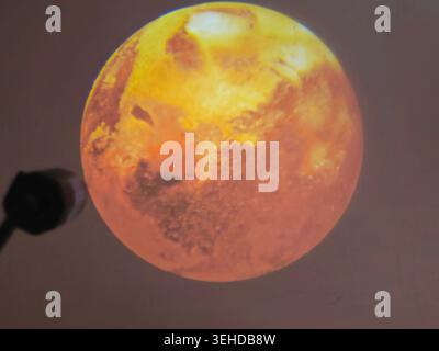a round projection of Mars, the fourth planet from the Sun, called the Red Planet due to its iron oxide-rich surface Stock Photo