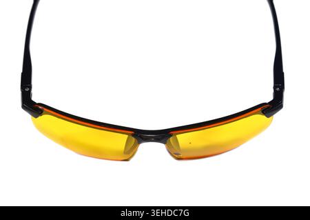 polarized night driving glasses with yellow lenses designed to reduce glare from headlights and streetlights, a yellow night driving glasses Stock Photo