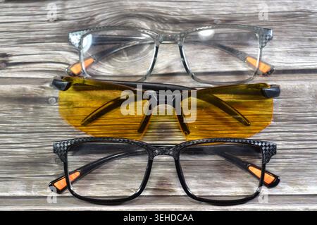 Yellow lenses polarized night driving glasses designed to reduce glare from headlights and streetlights and Glasses, eyeglasses, spectacles, vision ey Stock Photo