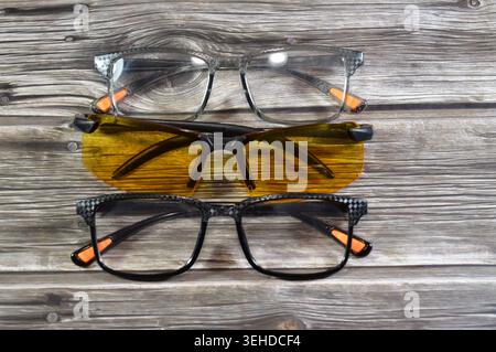 Yellow lenses polarized night driving glasses designed to reduce glare from headlights and streetlights and Glasses, eyeglasses, spectacles, vision ey Stock Photo