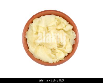 Gari, sliced ginger pickled, in a bowl on white background. It's a type of tsukemono from Japanese cuisine Stock Photo