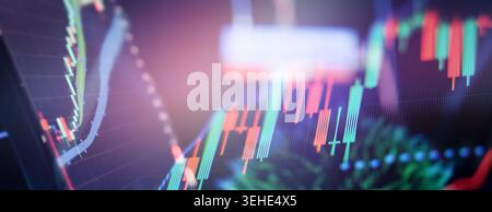 Extreme macro photography of a digital display showing financial candlestick charts and stock market data. Stock Photo