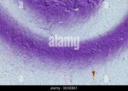 Abstract Purple Spray Paint Texture on Concrete Wall Stock Photo