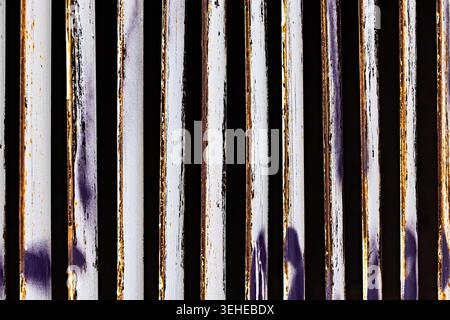 Weathered Metal Bars with Rust and Patina Vertical Pattern Stock Photo