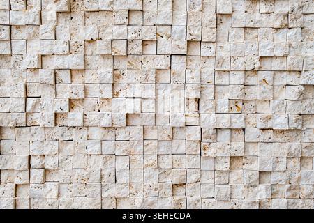 background of wall lined with square stones Stock Photo