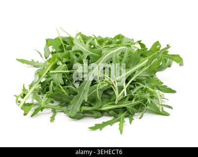 Heap of rocket salad leaves isolated on white background. Stock Photo