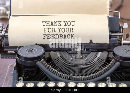 Thank you for your feedback symbol. Concept words Thank you for your feedback typed on old retro typewriter. Beautiful white paper background. Busines Stock Photo