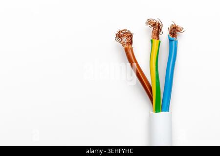 3 x 1.5 mm electrical cable with brown blue and yellow green wires isolated on white background Stock Photo