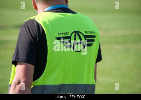 Rear view of a Airport Security Guard Stock Photo