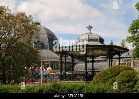 Historic bandstand and Octagon Dome in Pavilion Gardens, Buxton, Derbyshire, England, UK. Victorian architecture on a sunny summer day Stock Photo