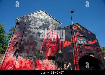 A mural paying tribute to Mohamed Salah has been unveiled near Anfield.  The giant artwork – created by local artist John Culshaw – has been erected on Anfield Road, opposite the King Harry pub.  It features two iconic celebrations from the Egyptian’s Liverpool career to date.  Salah was selected by fans to be the focus of the mural following a poll held by supporters group Spion Kop 1906. Stock Photo