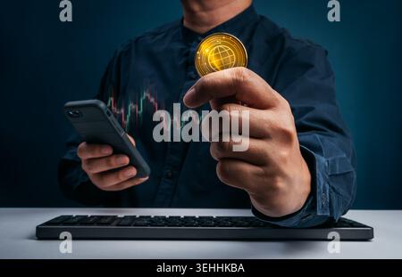 Crypto trading, digital investment concept with hand holding virtual coin and smartphone. Market analysis, blockchain technology, financial growth, on Stock Photo