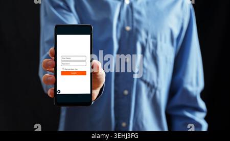 Person showing a smartphone with a login screen, illustrating concepts of online account access, data security, and digital privacy Stock Photo