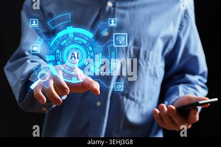 Man touching a futuristic AI interface, representing advanced technology, global networking, and data management Stock Photo