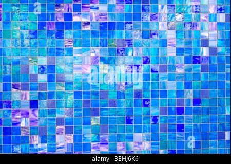 Small square pieces of blue tile, colored mosaic wall tiles as texture or background Stock Photo
