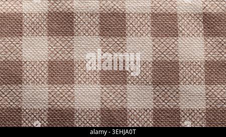 Brown and beige woven wool fabric with geometric diamond pattern for a rustic textile background Stock Photo
