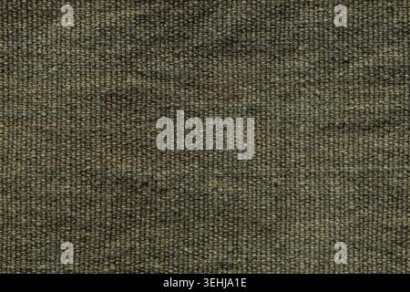 Olive green burlap fabric texture background with rough woven weave for rustic natural textile backdrop Stock Photo