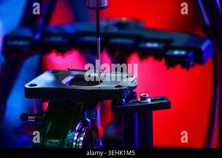 Coordinate measuring machine CMM probe inspecting metal part component dimension in quality control process Stock Photo