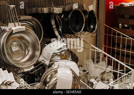 Belgrade, Serbia - May 12 2026. Stainless steel kitchen strainers and colanders displayed in IKEA cookware department. Stock Photo