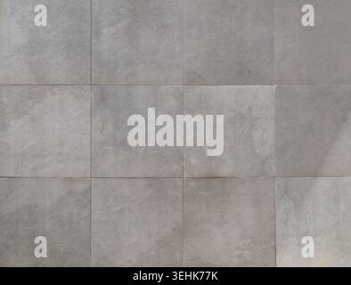 Elegant large gray square stone tiles. Background and texture. Stock Photo