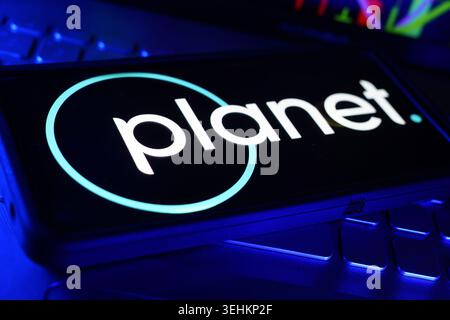 Planet Labs Earth Observation Satellite Imagery Company Logo Displayed On Screen With Financial Stock Chart Performance Background Stock Photo