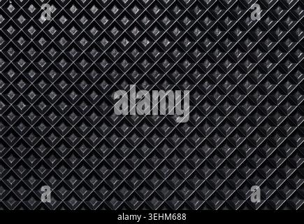 Macro shot of a black rubber running belt texture from a treadmill. Top view of non-slip embossed diamond pattern surface for sports equipment and fit Stock Photo