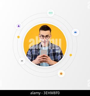 Young Man Reacts With Excitement While Using Smartphone Against a Bright Yellow Background Stock Photo