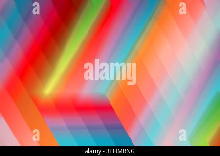 Abstract multicolored background featuring diagonal geometric shapes that blend harmoniously. Dynamic composition with bold colors, perfect for modern Stock Photo