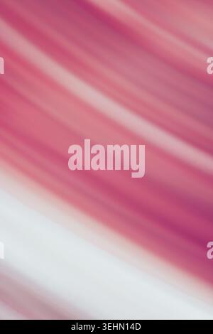 Abstract pink motion blur background with diagonal stripe and soft gradient tones. Smooth defocused texture suggests speed, flow, and modern design fo Stock Photo