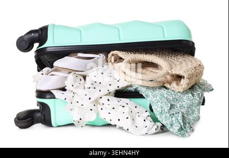 Suitcase with packed stuff isolated on white Stock Photo
