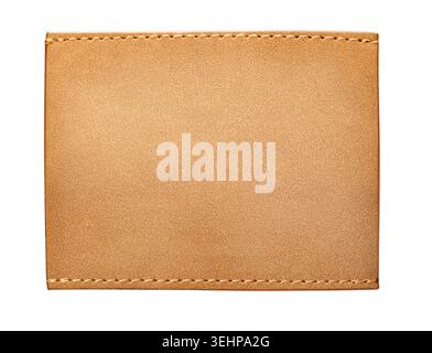 Rectangular tan leather patch displaying stitched edges and a textured surface Stock Photo