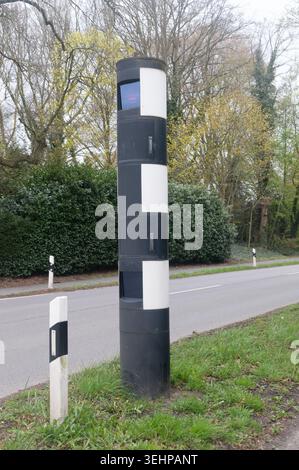 Rheine, Germany - April 5, 2026: Black and white speed camera pylon. Stock Photo