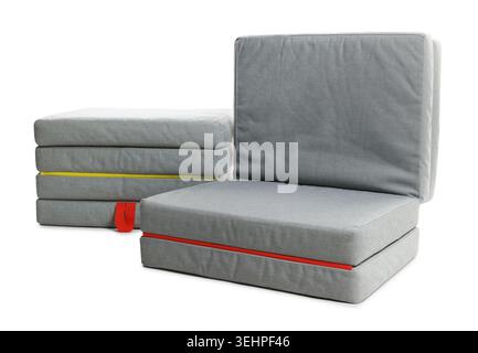 Stylish grey folding mattress isolated on white Stock Photo