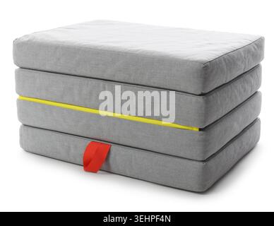 Stylish grey folding mattress isolated on white Stock Photo