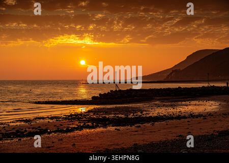 Sunset over the West Shore, Llandudno on the North Wales coast Stock Photo