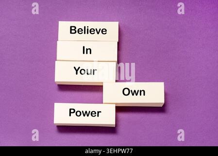 Motivational Inspirational Phrase Believe on Your Own Power on minimalism background Stock Photo