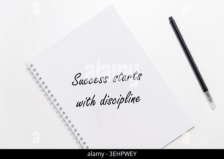 Motivational Inspirational Phrase Success Starts With Discipline on minimalism background Stock Photo