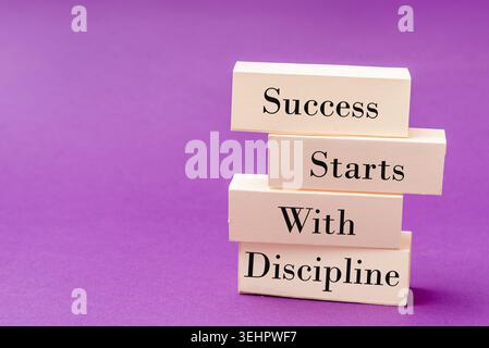 Motivational Inspirational Phrase Success Starts With Discipline on minimalism background Stock Photo