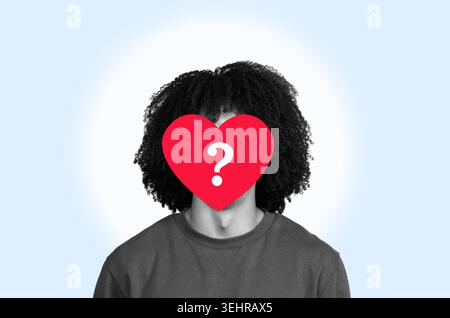 Person With Heart Symbol Instead of Face on Light Background Stock Photo