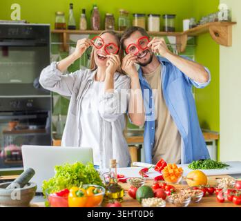 Young family making video how to eating healthy and having fun Stock Photo
