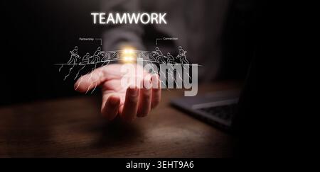 Hand holding glowing teamwork bridge drawing with people building connection across gap. Business collaboration, partnership, problem solving, unity, Stock Photo