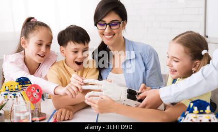 Engaging Children in Robotics Workshop to Inspire Creativity and Learning Stock Photo
