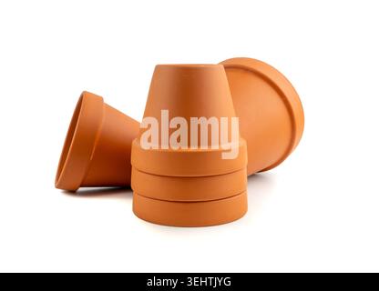 Empty terracotta flower pots, clay garden vase, brown ceramic plant container, terra cotta flowerpot, garden pottery earthenware on white background Stock Photo
