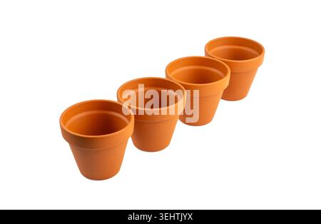 Empty terracotta flower pots, clay garden vase, brown ceramic plant container, terra cotta flowerpot, garden pottery earthenware on white background Stock Photo